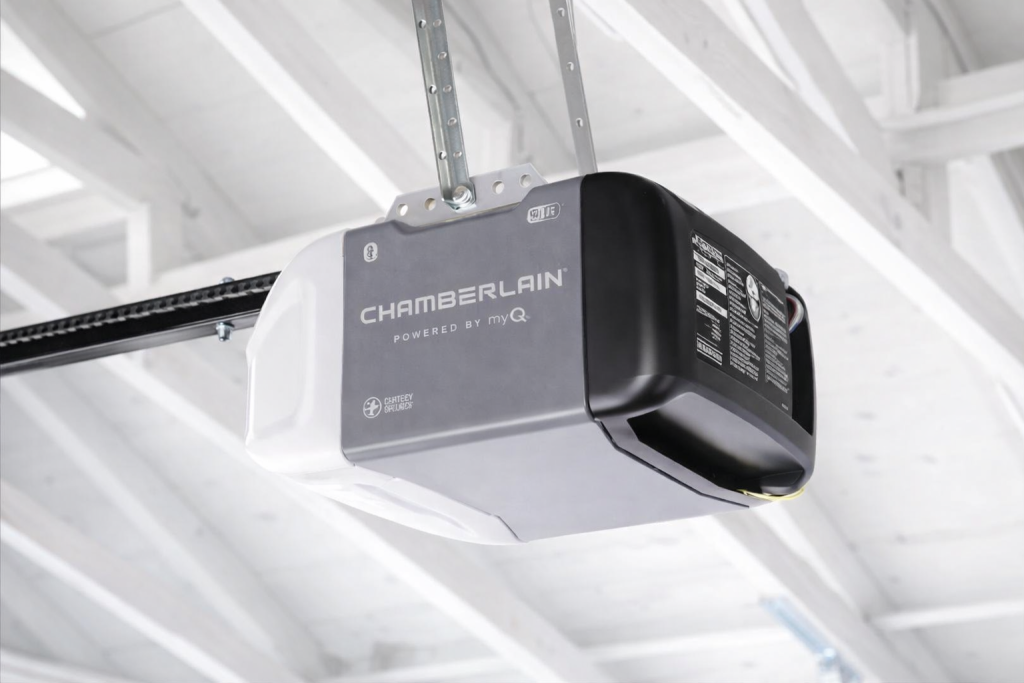 Chamberlain Garage Door Opener and Remote Setup: Complete Programming Guide 1 Chamberlain garage door opener mounted on garage ceiling during setup, featuring MyQ-enabled smart system and belt drive motor for quiet operation.